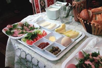 Breakfast at the budget-friendly Cth Baku Hostel in Azerbaijan.