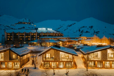 Night falls over a ski chalet in Gudauri, Georgia.