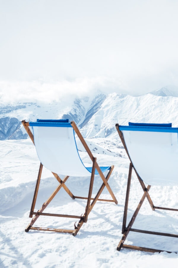 Two deck chairs facing the mountains in Gudauri.