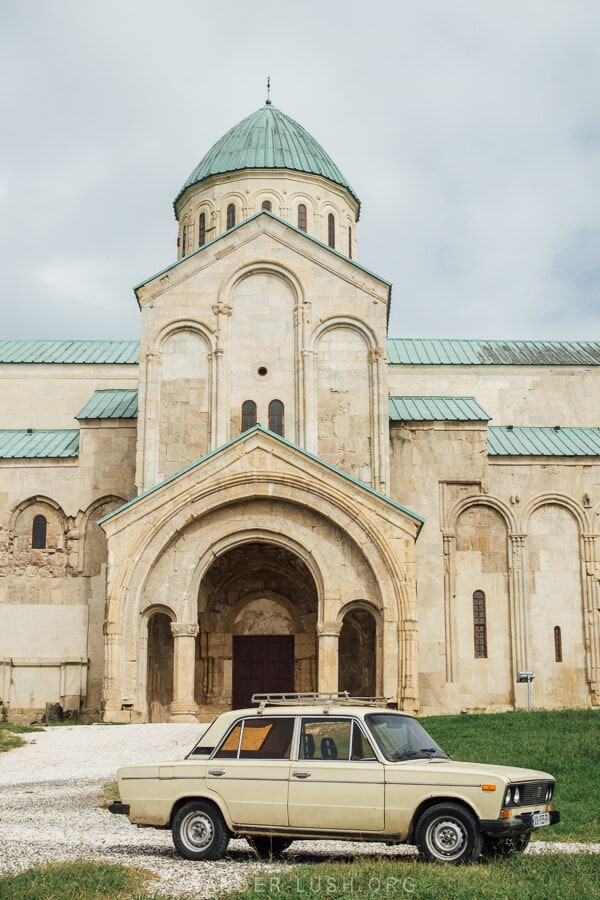 A Lada car parked in front of Bagrati Cathedral in Kutaisi.