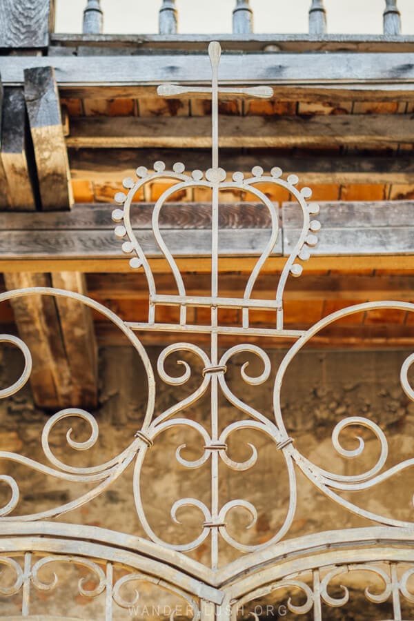 A metal gate with the shape of a royal crown at Golden Marquee in Kutaisi.