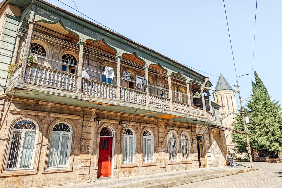 A beautiful old building with ornate windows in Kutaisi.