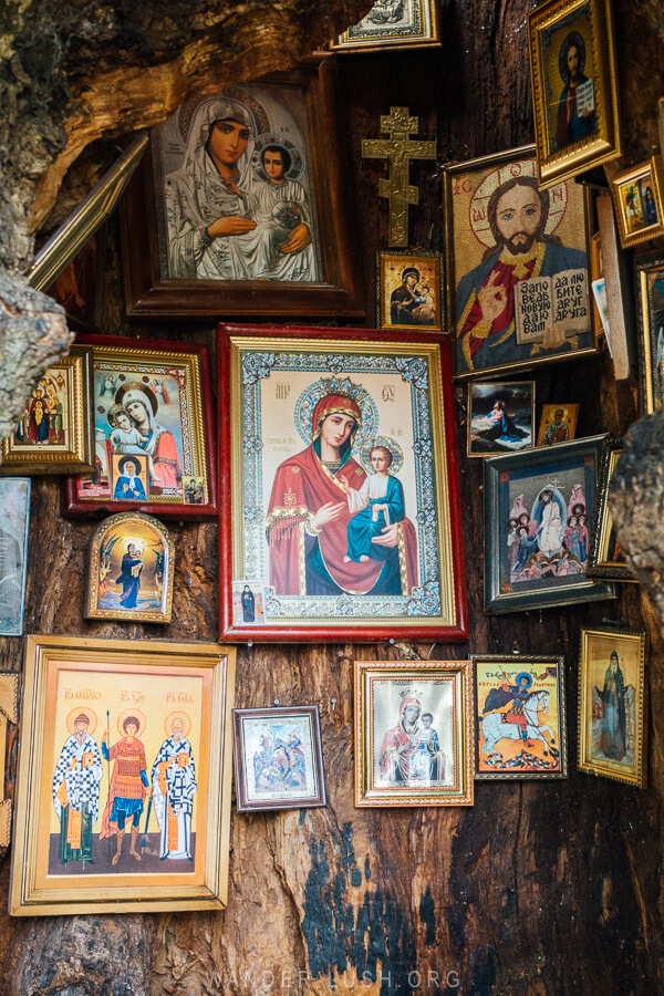 Orthodox icon paintings in a tiny chapel inside a tree trunk in Kutaisi.