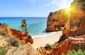 rocky beach at sunset, lagos, portugal