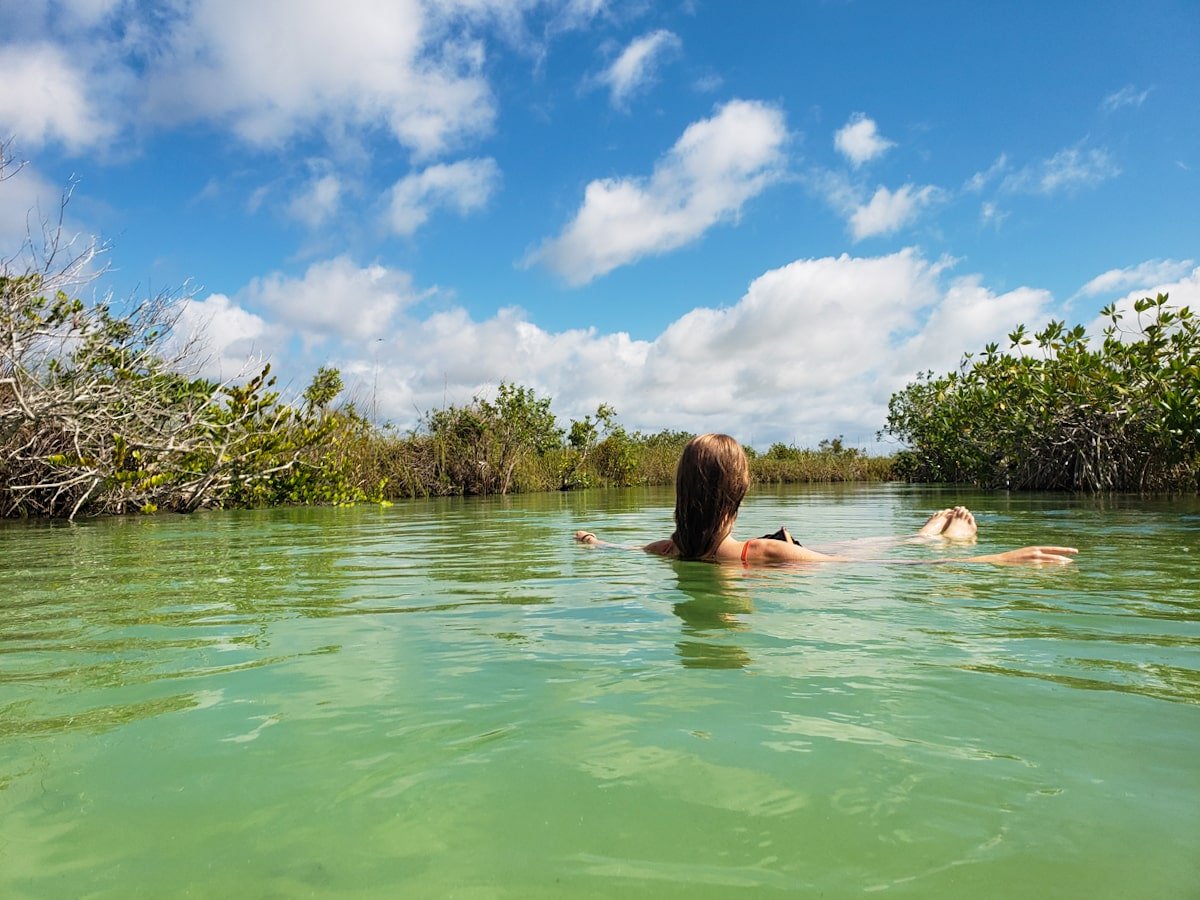 Floating down the Muyil canal float inside Sian Ka'an lagoons near Tulum, Mexico.