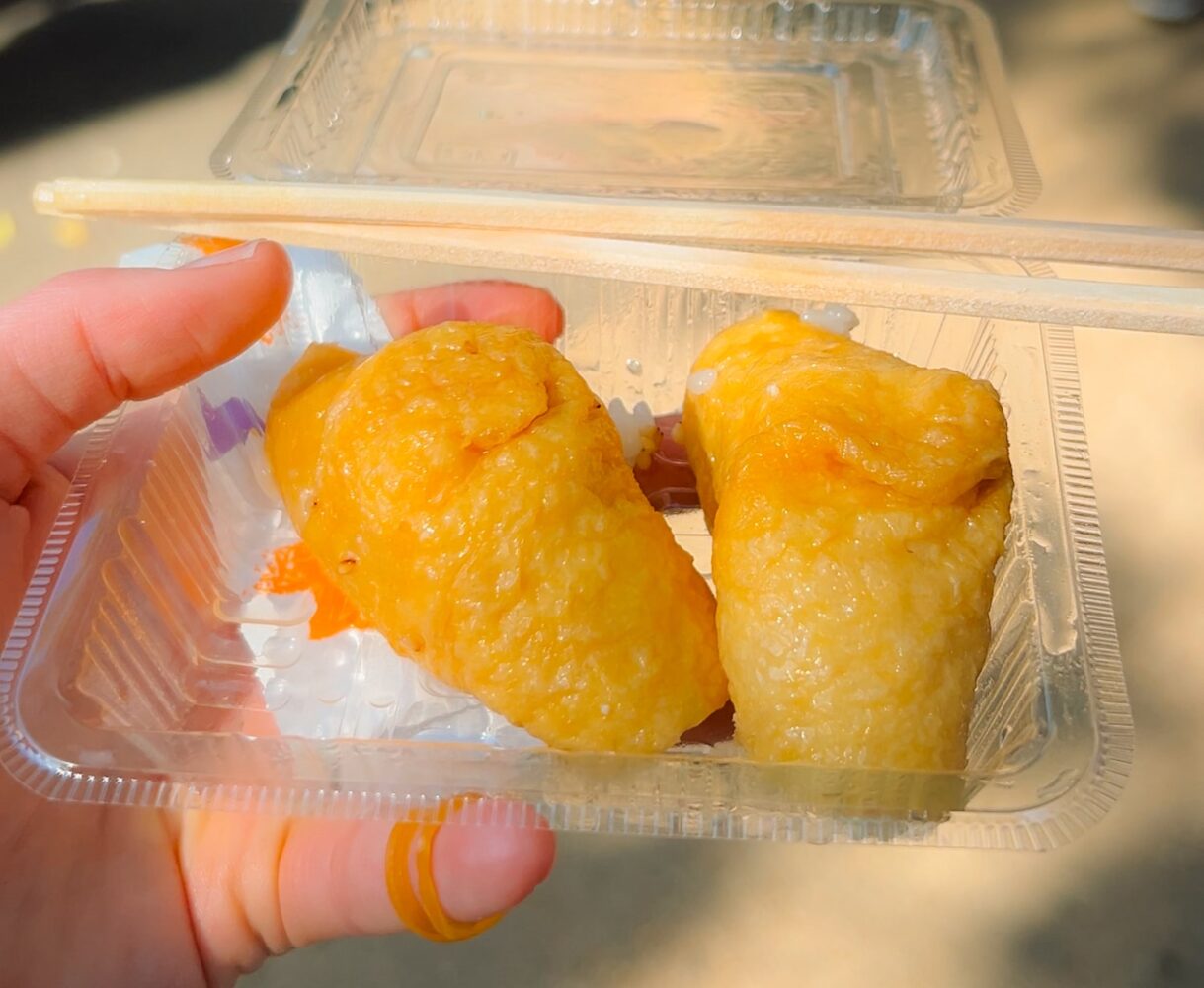 Inari sushi snack—vinegared rice and tofu skin (yuba) at Fushimi Inari Shrine.