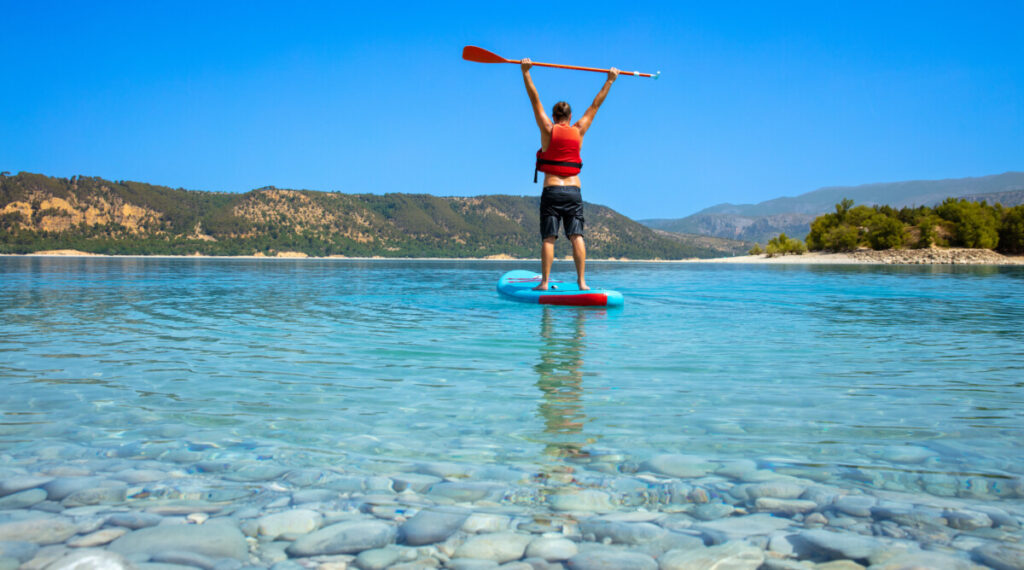 Man paddleboarding in Gorges du Verdon, France