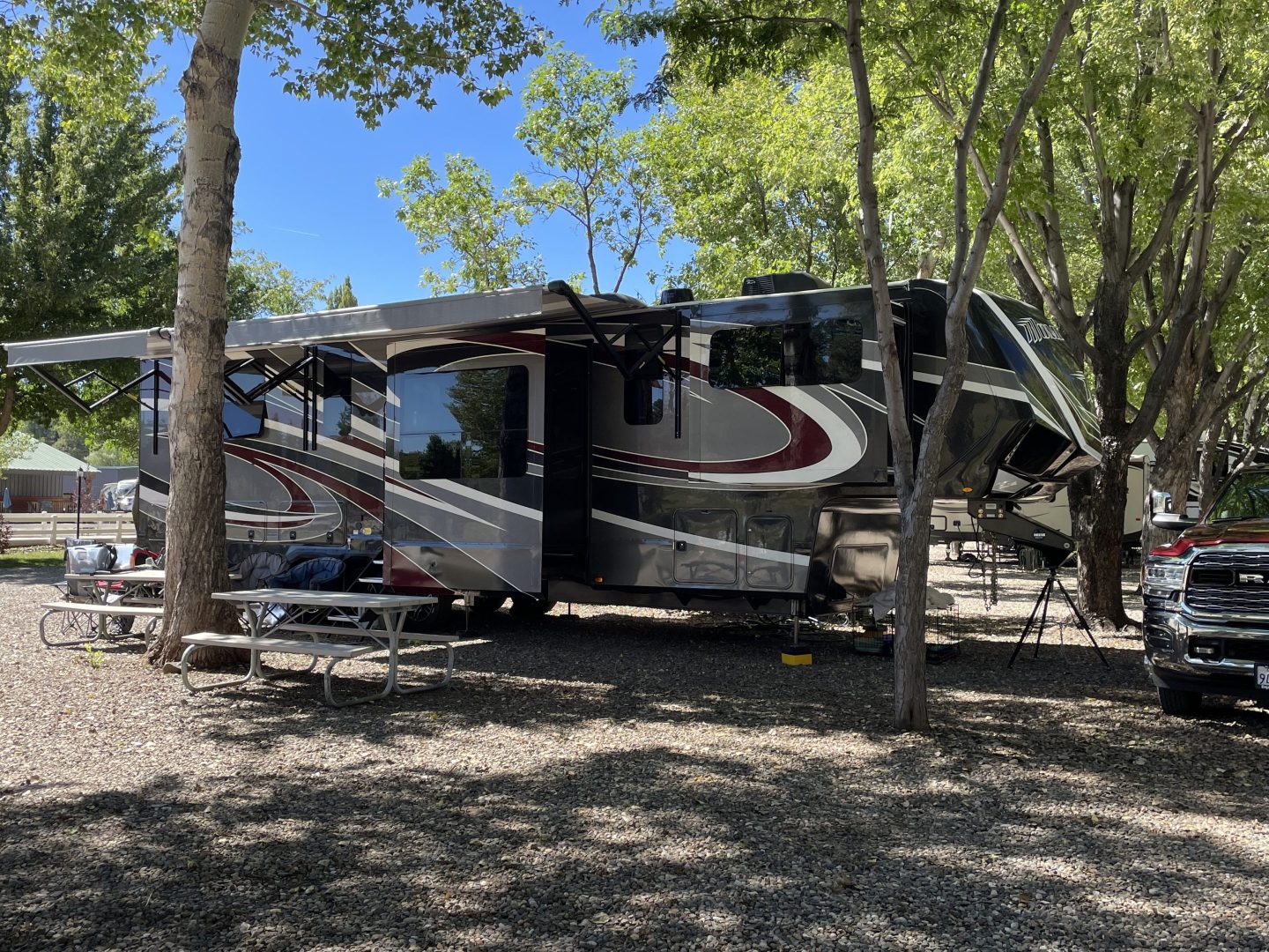 Photo of a recreational vehicle parked in the woods