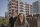 A photo of two people on a balcony in Argentina.