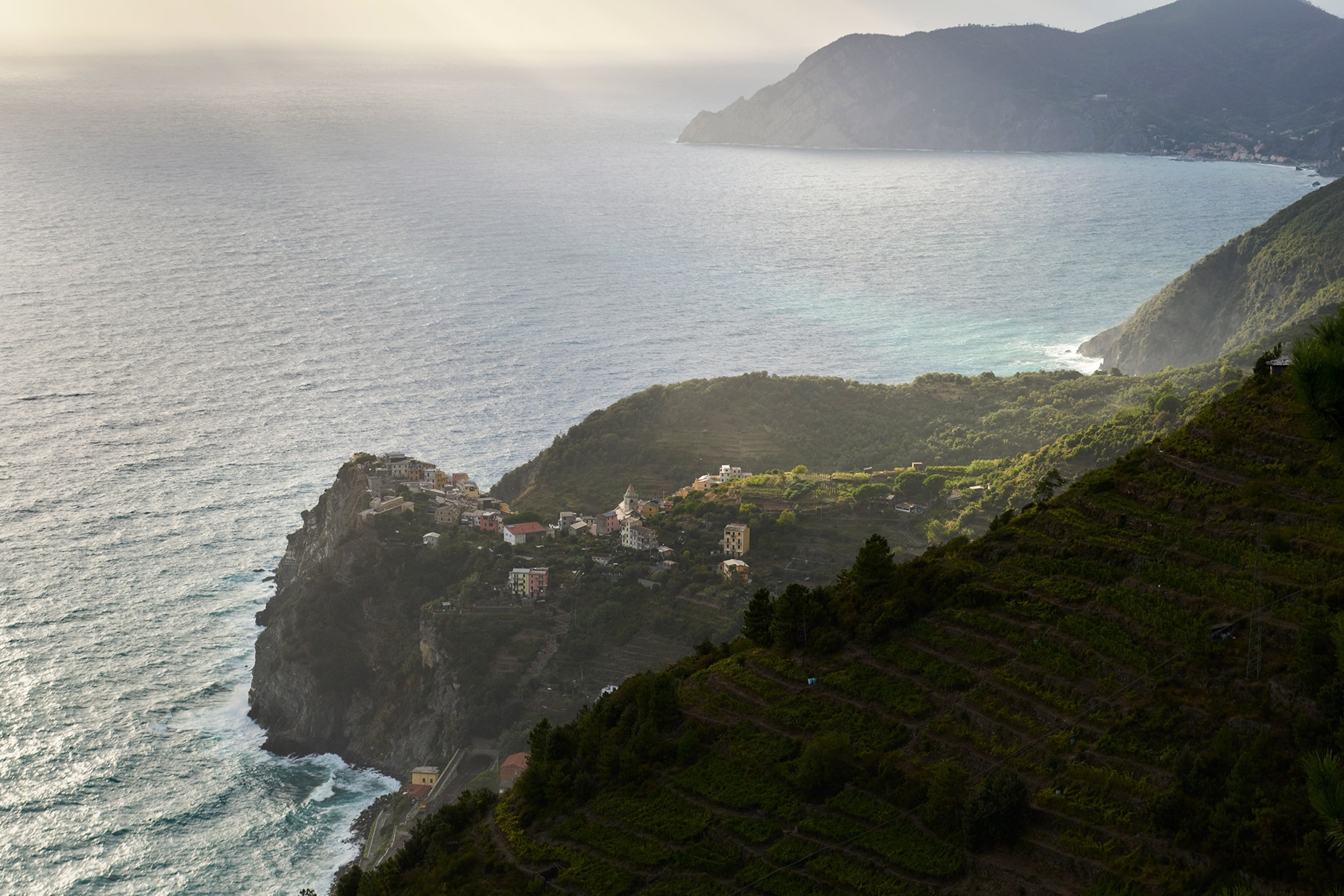 Corniglia, and some vineyards, seen from the coastal road that goes through Cinque Terre