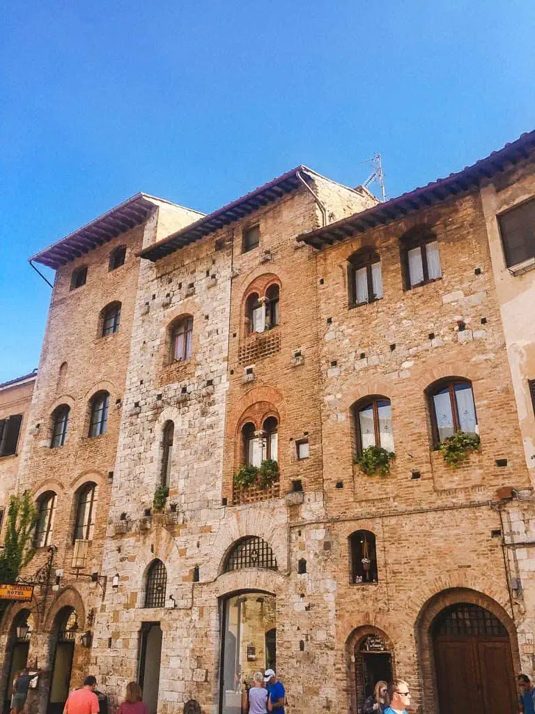 Exterior brick buildings in San Gimignano, Italy