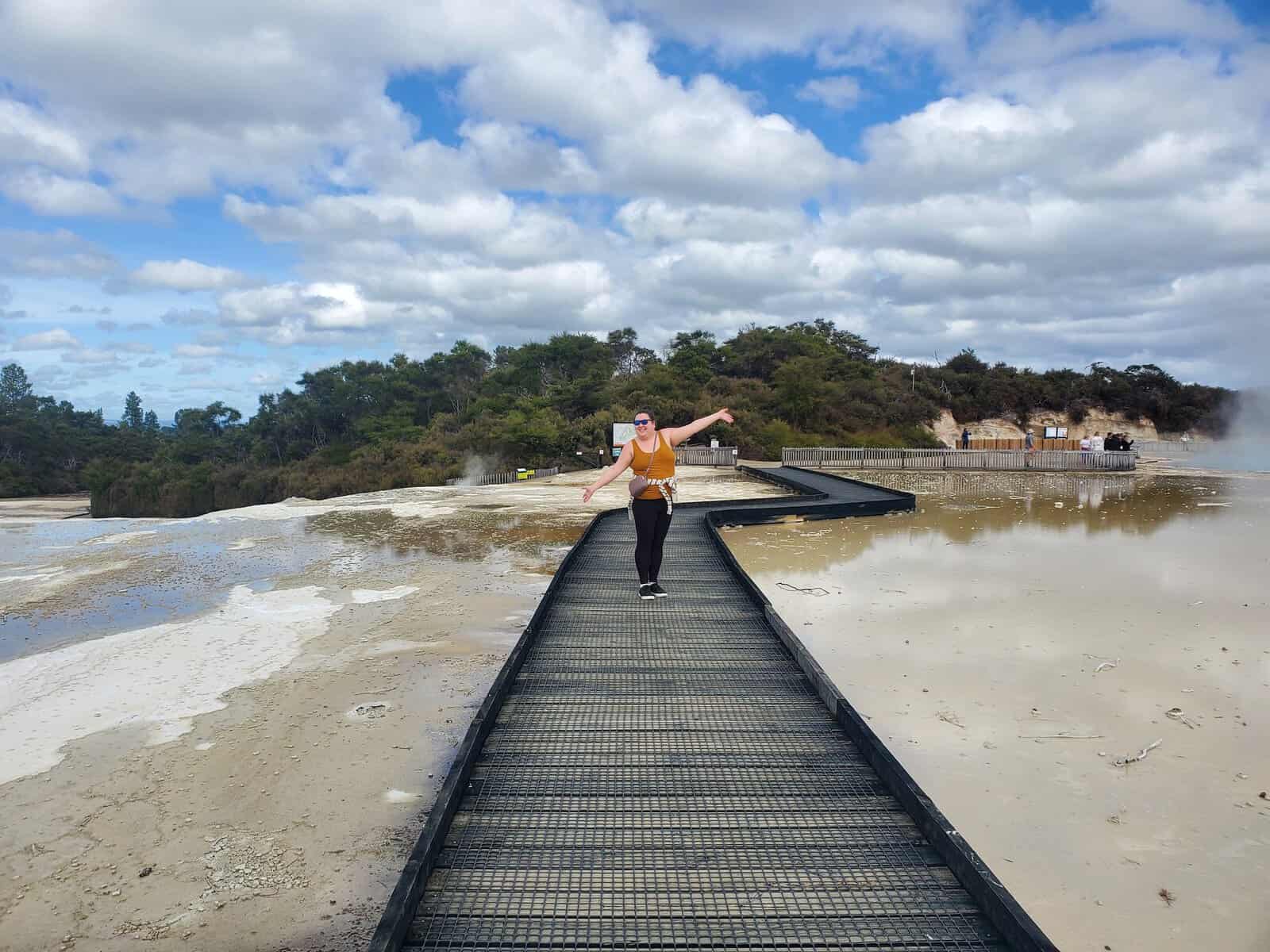 Riana on a bridge at Wai o Tapu Thermal Wonderland in Rotorua