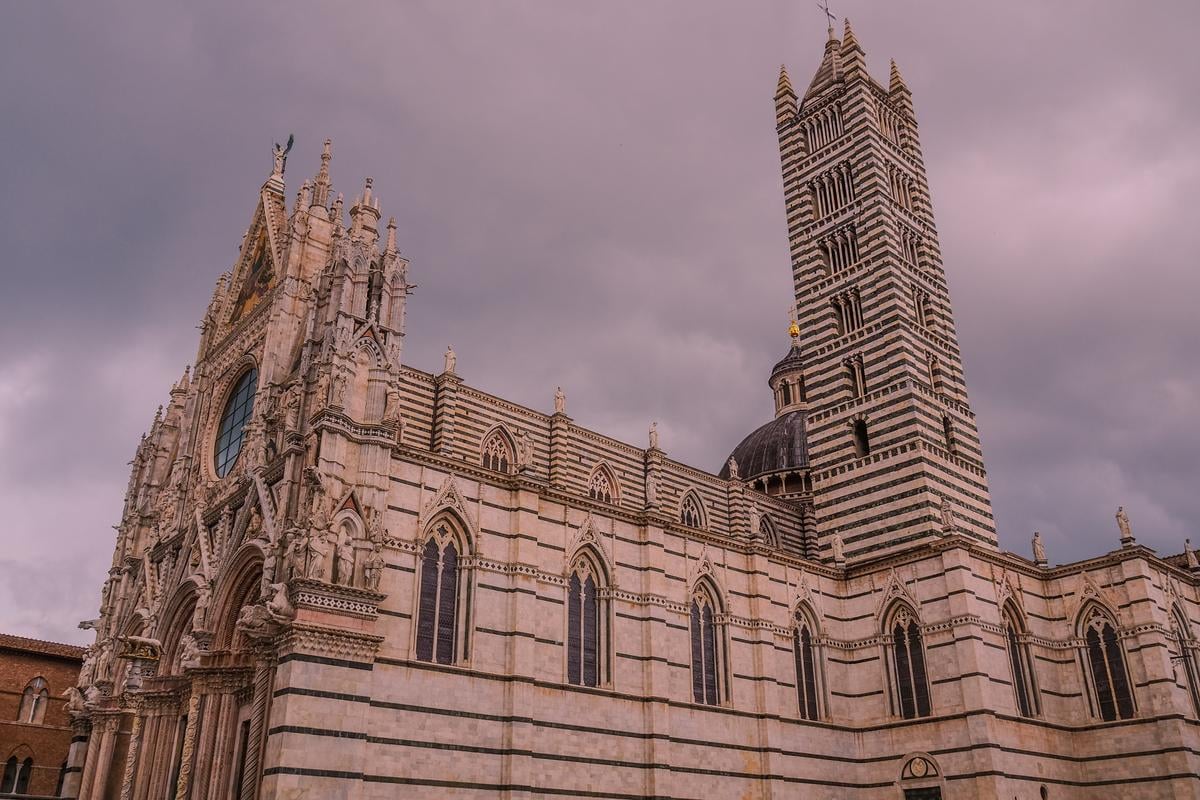 Siena Cathedral's Gothic facade at sunset, Tuscany