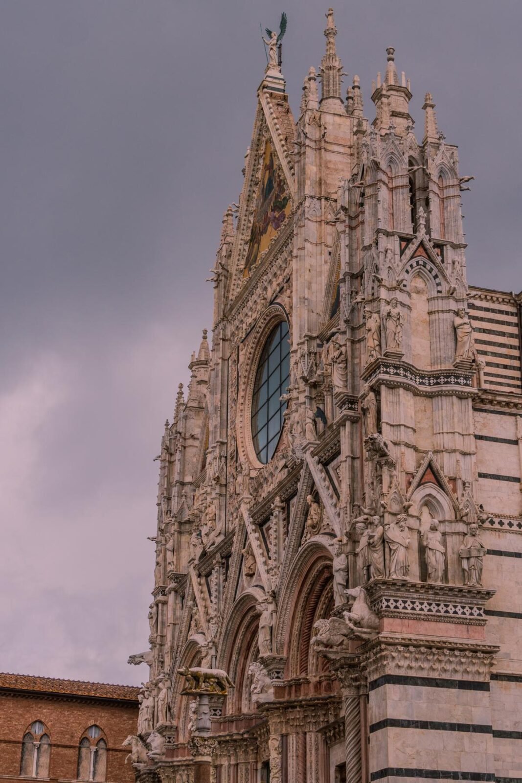 Siena Cathedral Gothic façade with sculptures and rose window