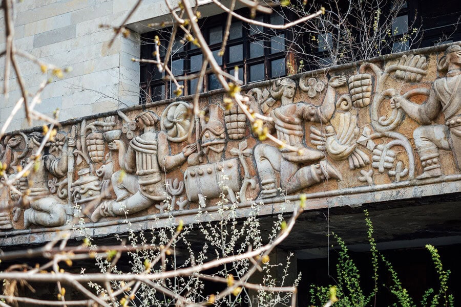 A Soviet bas relief sculpture on the facade of an abandoned wine factory in Sagarejo, Kakheti, Georgia.