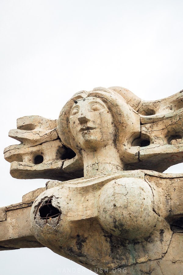 Peace by Nugzar Manjaparashvili, a Soviet concrete statue in Kakheti of a woman outstretched.