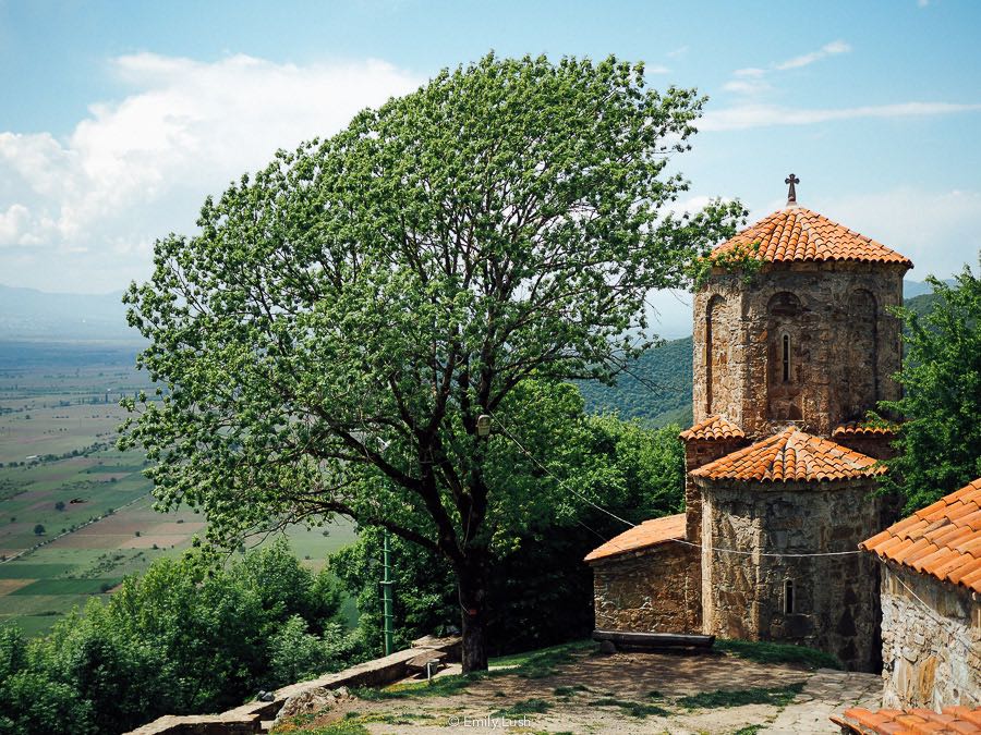 A beautiful red-roofed church on a hill overlooking the Alazani Valley.
