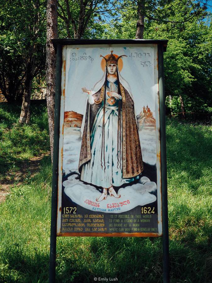 A sign for Gremi Church in Kakheti with the image of a saint.