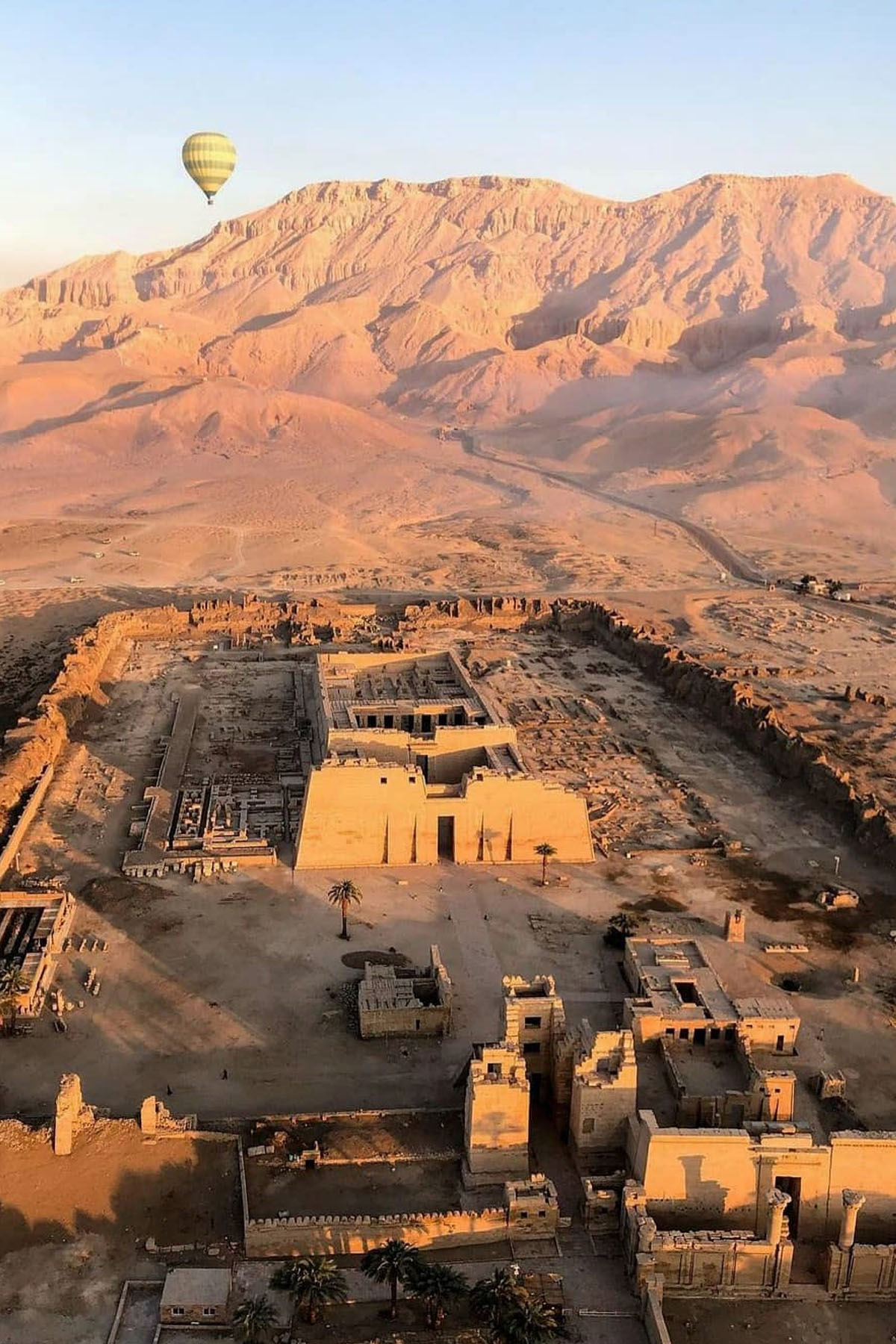 The temple of Ramses III at Medinat Habu in Luxor is shown from above during a hot air balloon ride. 