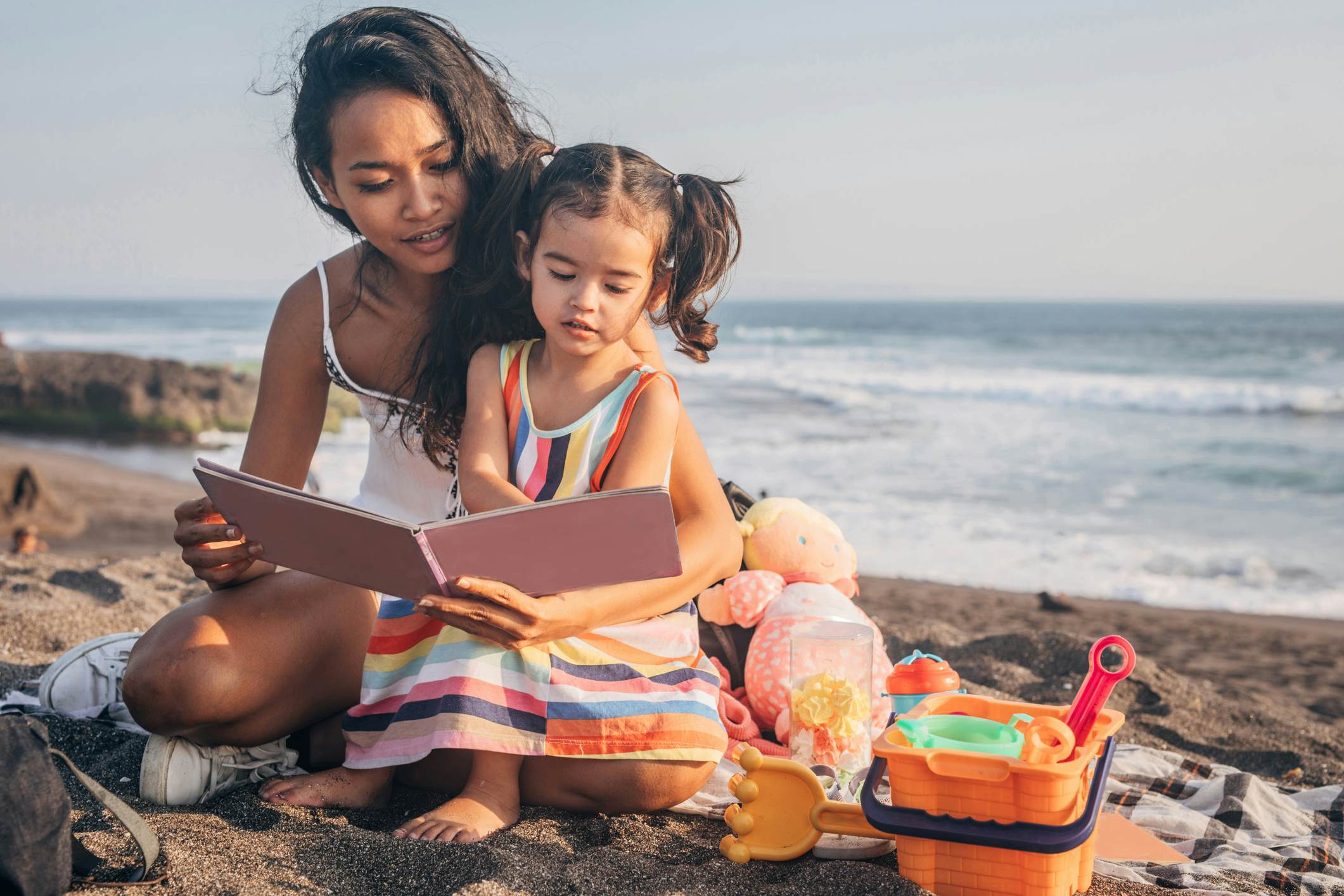 Mom and daughter on the beach in Indonesia