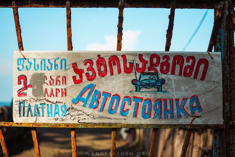 A sign for car parking in Georgia.