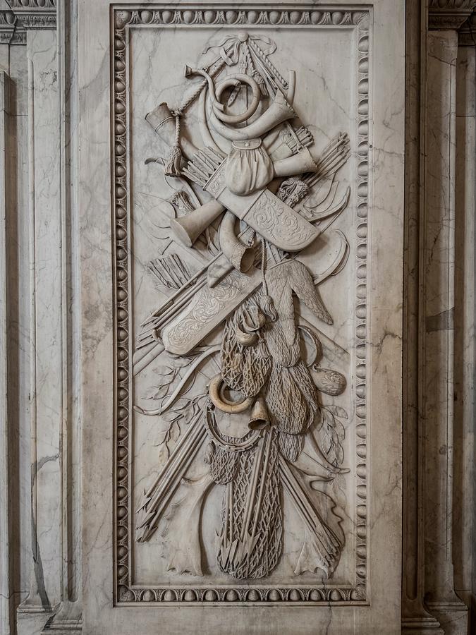 Intricate marble sculpture in Royal Palace Amsterdam interior showcasing artistic craftsmanship