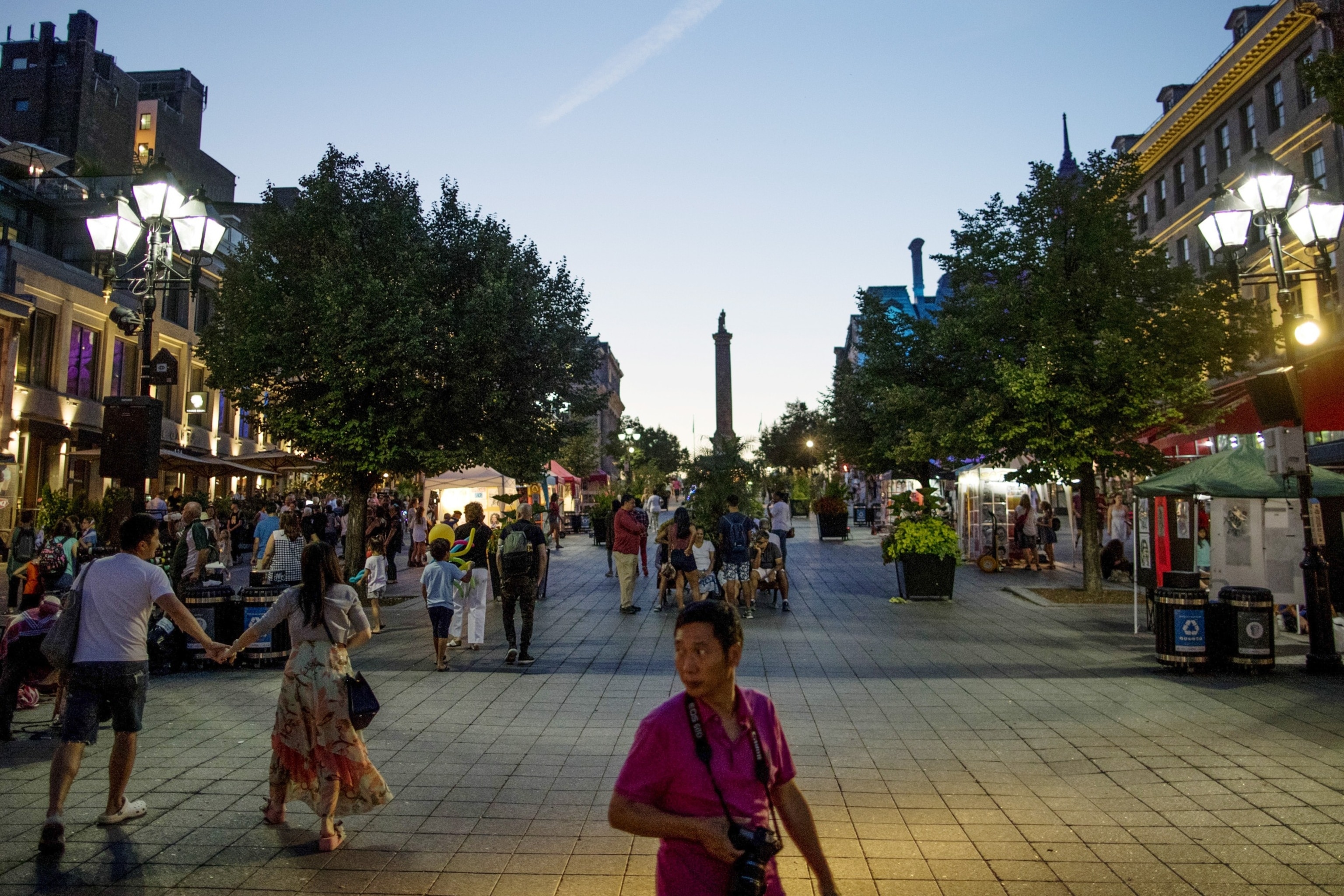 PHOTO: Tourists walk through the Place Jacques-Cartier in Montreal, Quebec, Canada, Aug. 19, 2018. 