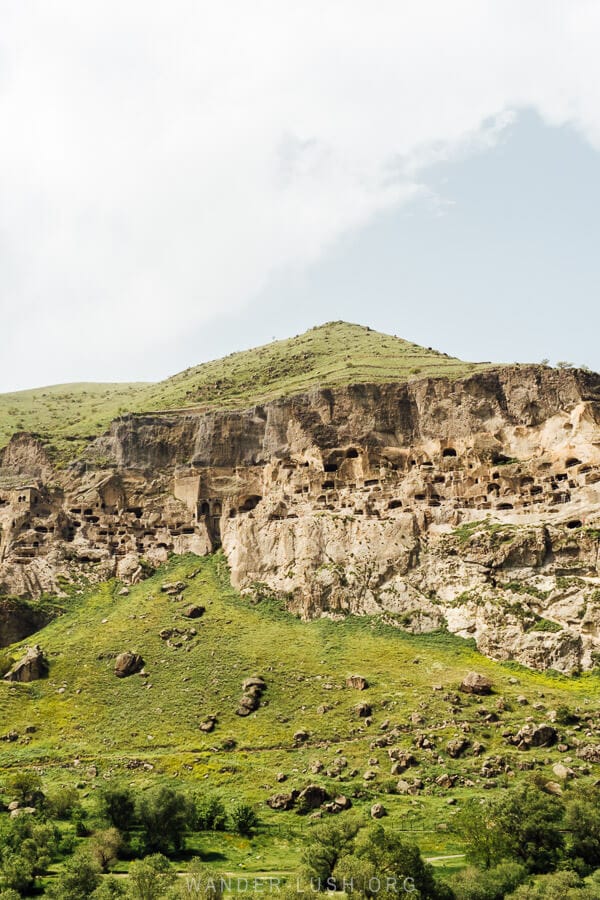 Vardzia Cave City in Georgia viewed from the riverside.