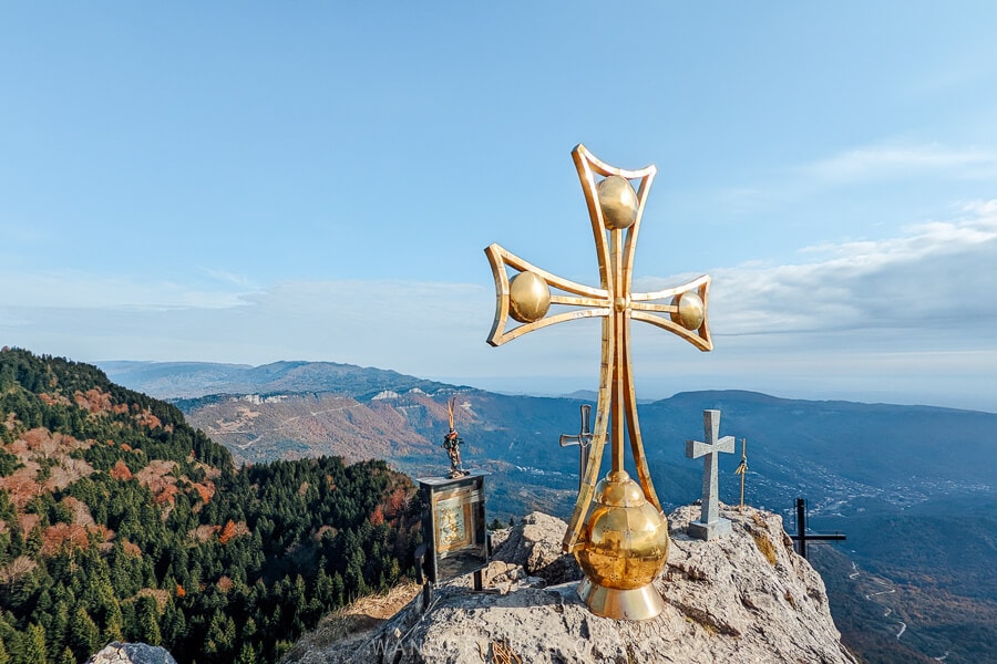 The peak of Tskhrajvari, a mountain peak and shrine with crosses planted on it at the border of Racha and Imereti regions.