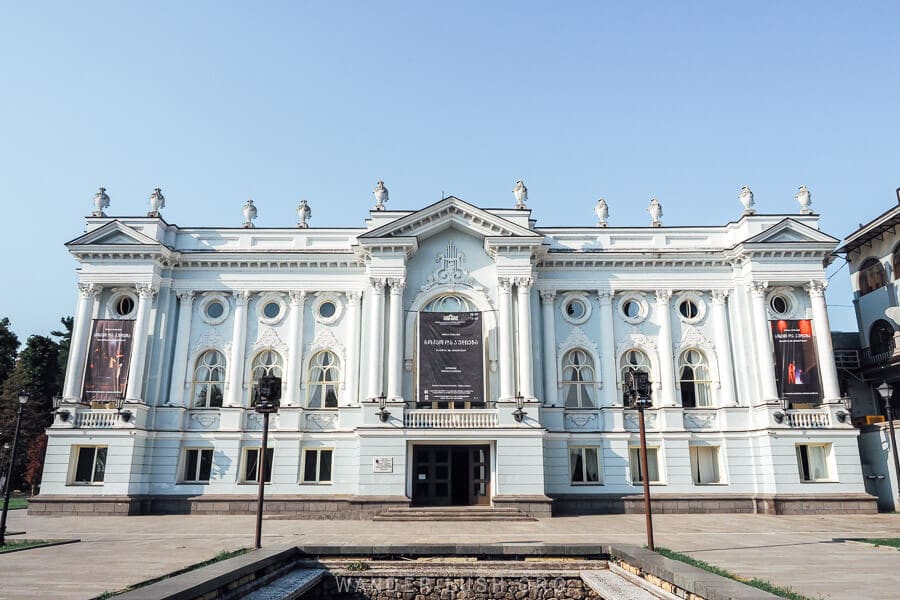 The beautiful Senaki Theatre, with a baby blue facade.