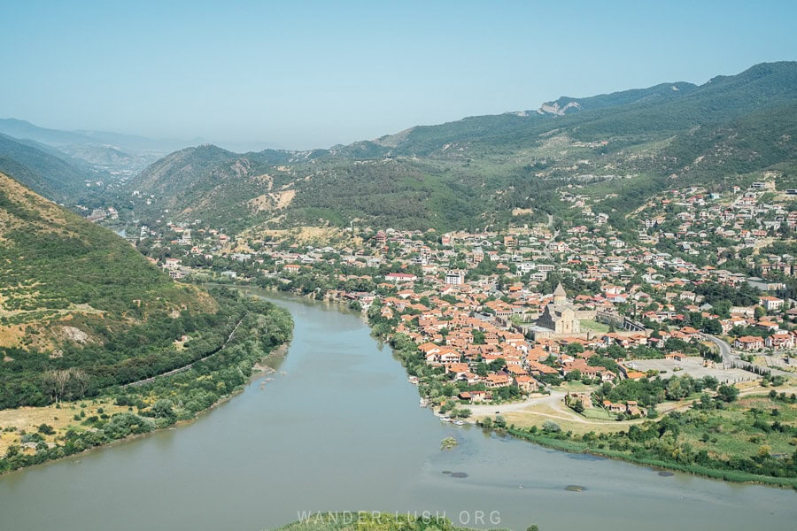 A panoramic view of the city of Mtskheta in Georgia, with the meeting of the Aragvi and Mtkvari Rivers in the foreground.