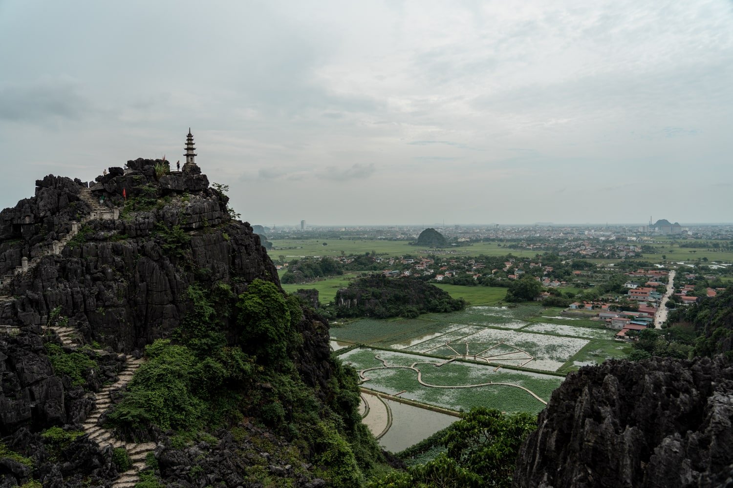 Viewpoint overlooking Hang Mua Pagoda and city of Ninh Binh in the distance.