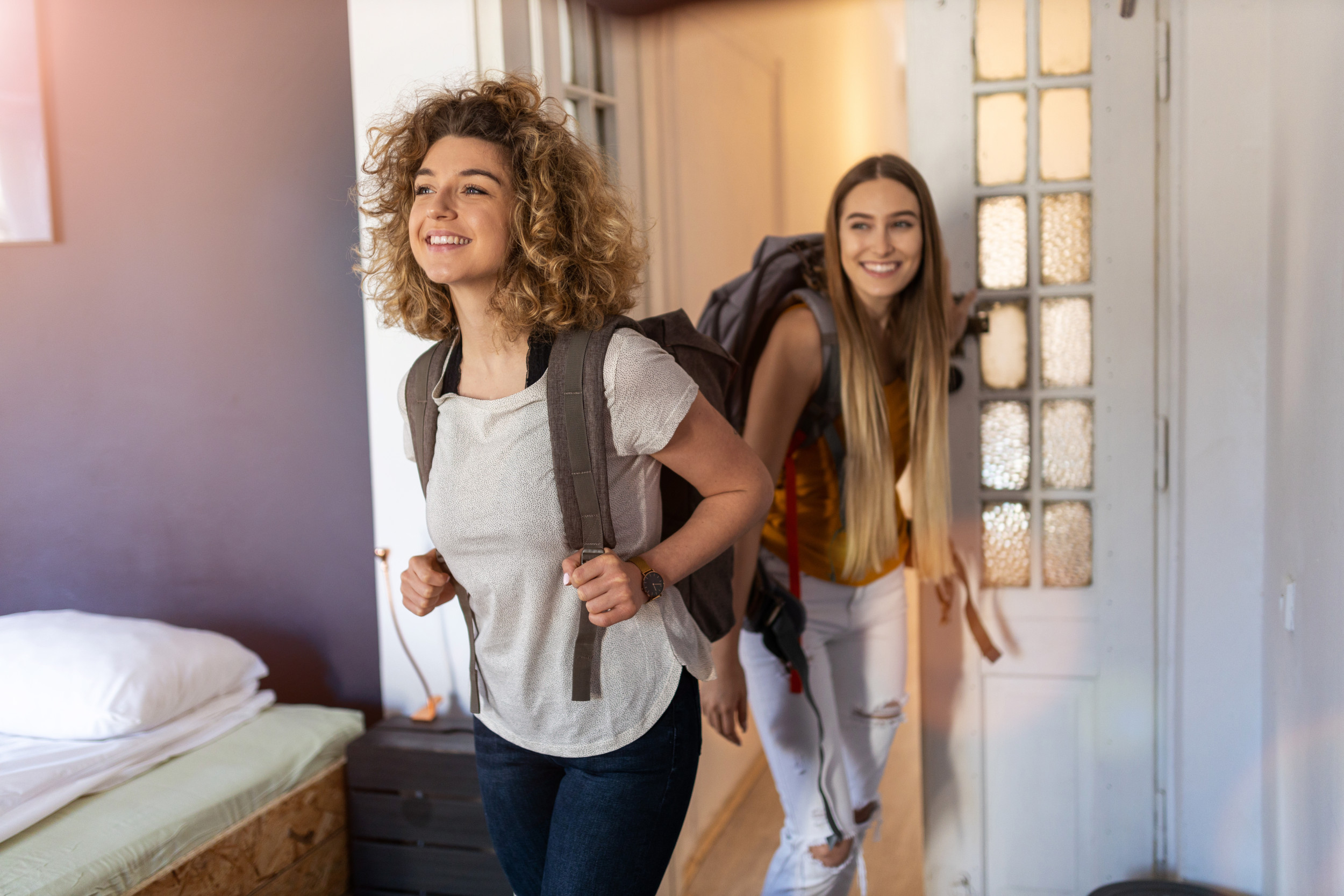 Women entering a hostel.