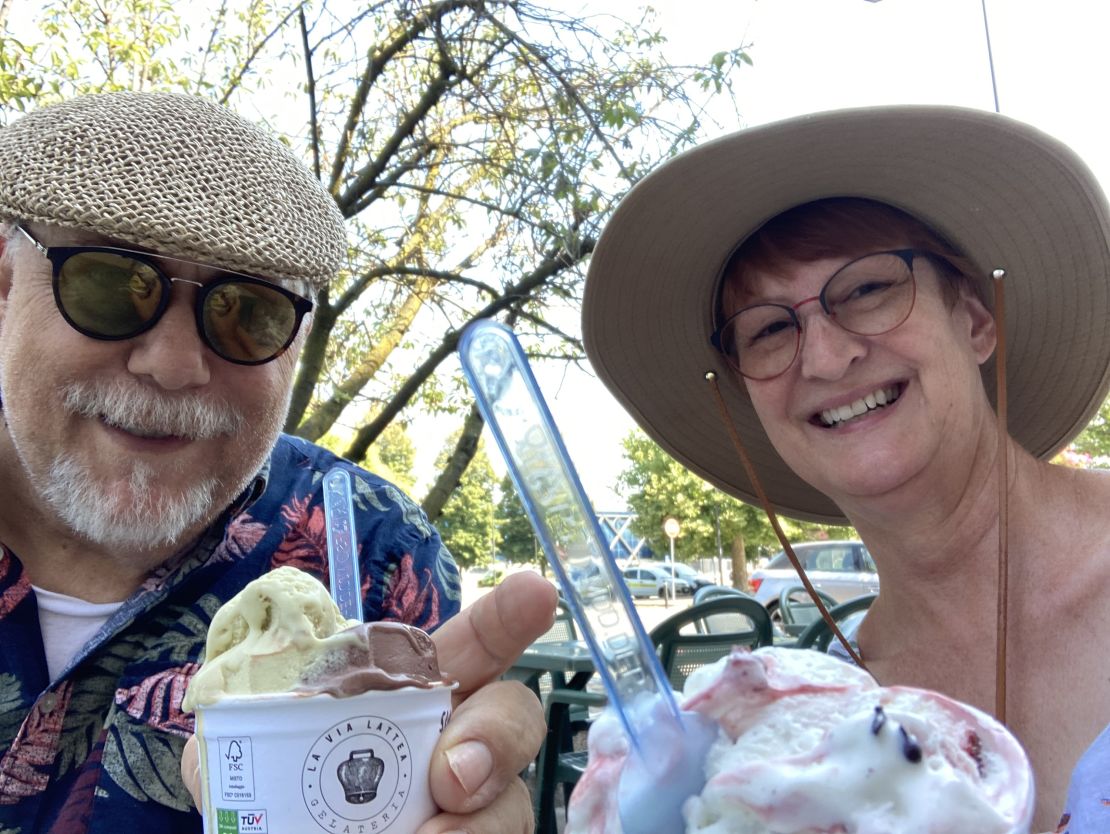 Patience Dunbar and her husband, Charles Ippoliti, at their favorite gelateria in Arona, Italy, in April 2023.