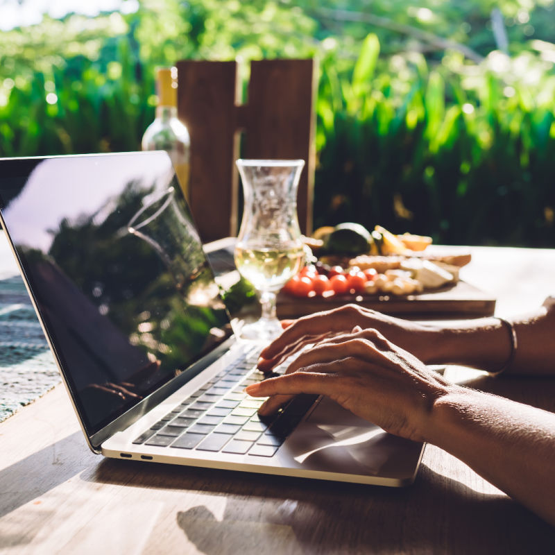 Hands-on-Laptop-Working-on-Desk