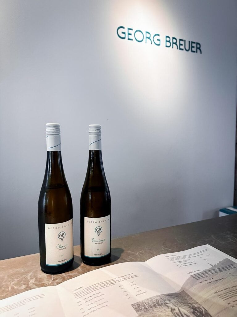 Georg Breuer Riesling Charm and Sauvage wines displayed in a vineyard tasting room in Rüdesheim am Rhein, Germany