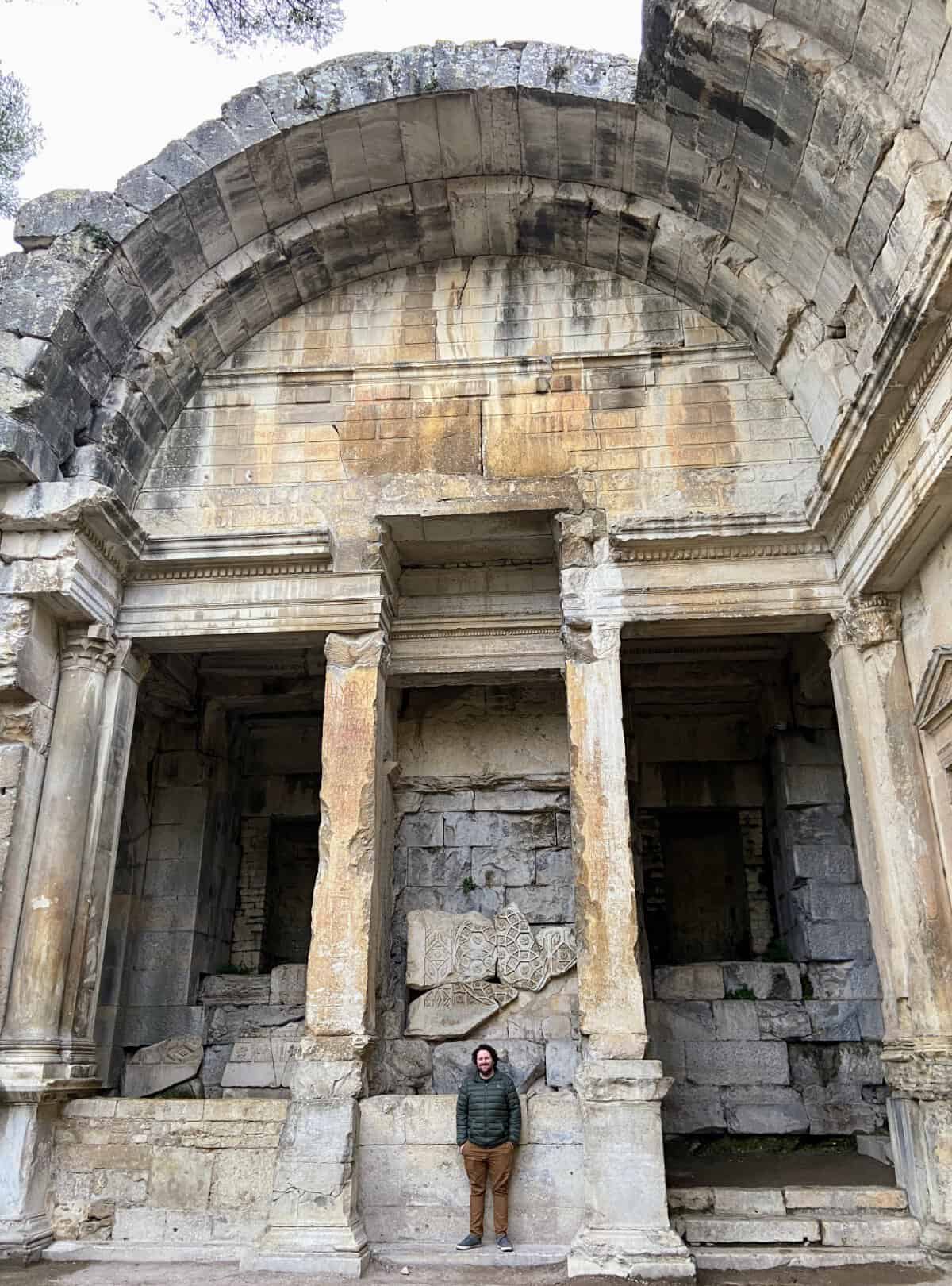 Colin standing in the Temple of Diana at Les Jardins de la Fontaine, Nimes, France