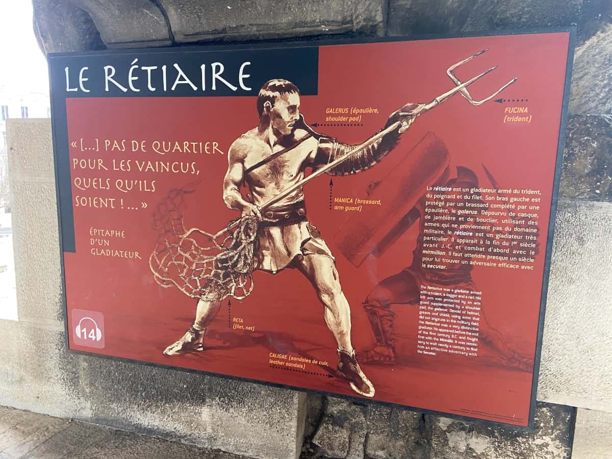 A board teaching us about one of the types of gladiators inside The Amphitheatre of Nîmes