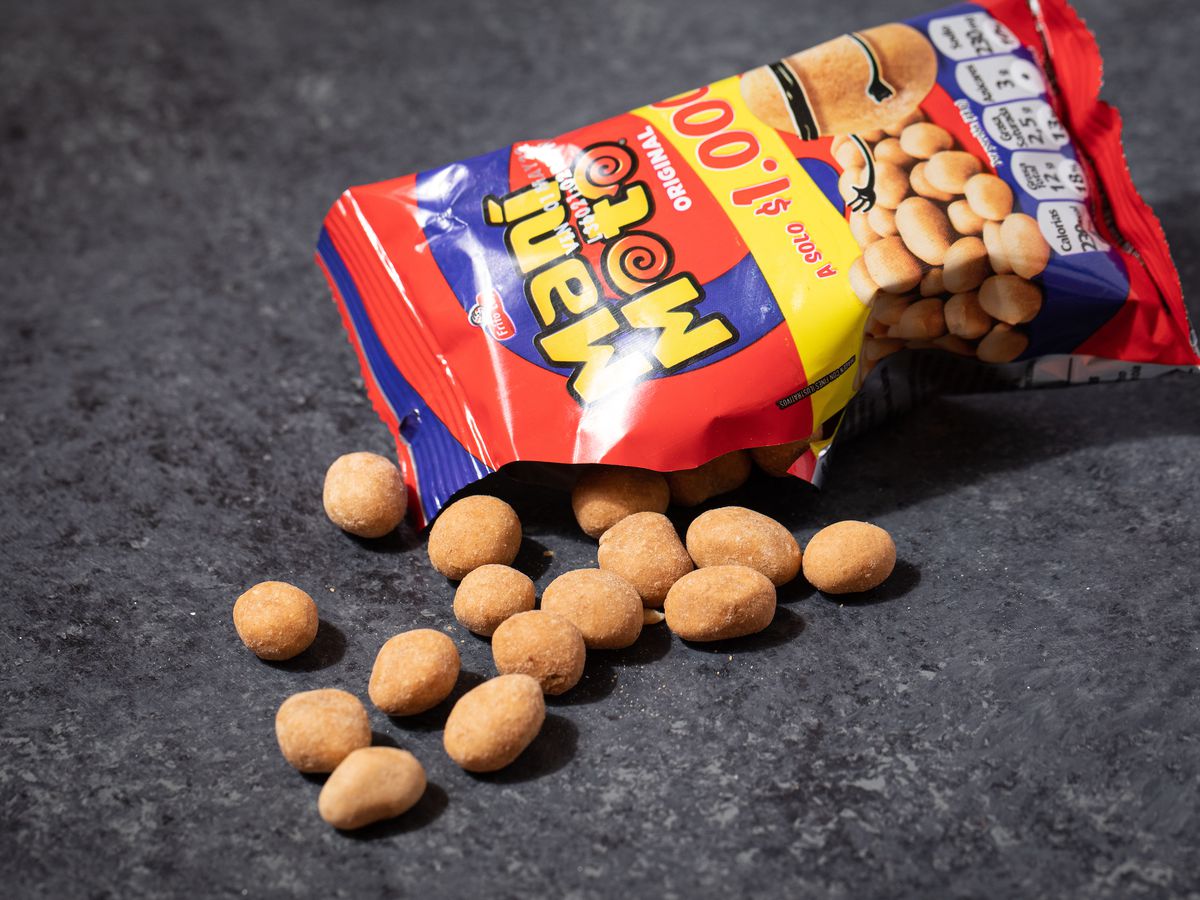 An opened bag of wheat-flour coated peanut snacks 