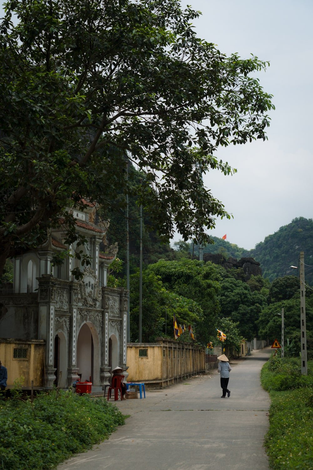 Local Vietnamese women on countryside lane near Ninh Binh, Vietnam.