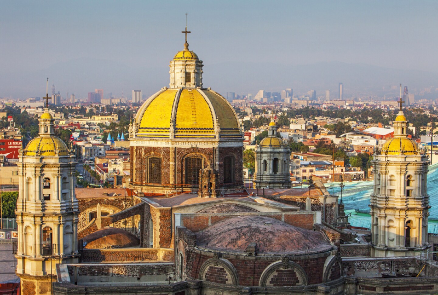 Cityscape with yellow-domed church