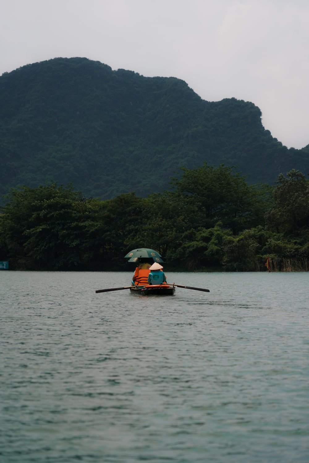 Trang An boat tour on the Ngo Long River in Vietnam.