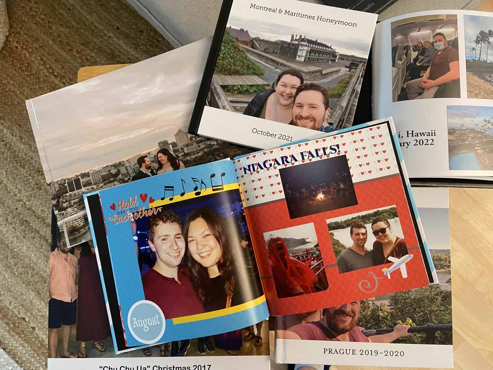 Online photo book maker, pile of photo books stacked on top of each other