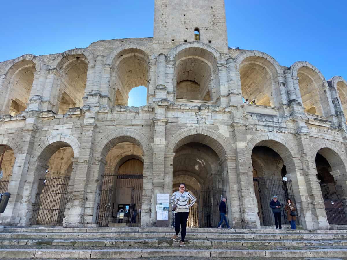 Riana in front of the Arles Amphitheatre or Arènes d'Arles, France