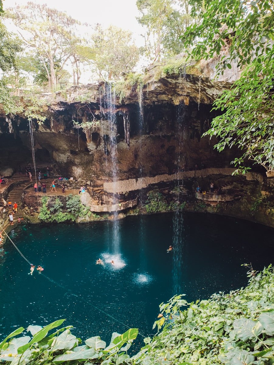 swimmers in cenote zaci