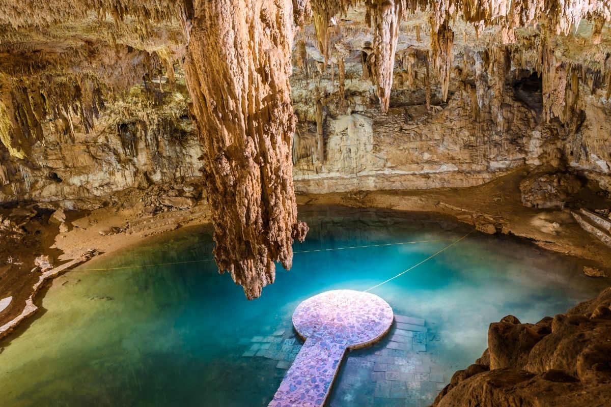 aerial view of cenote suytun with light beam