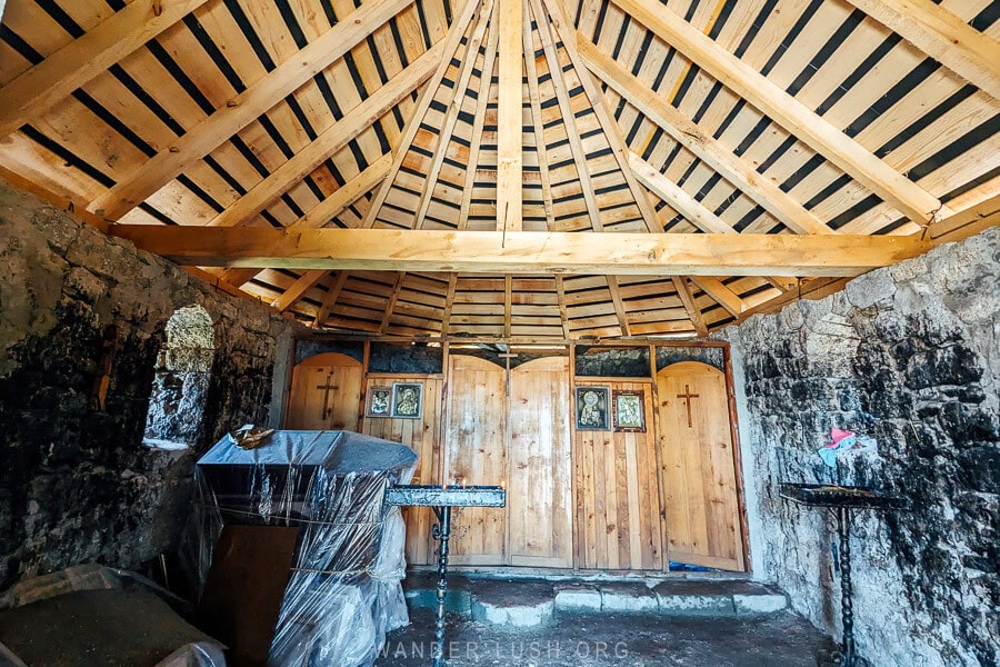 Inside St George Church on Khvamli, with icons and new wooden roof beams.