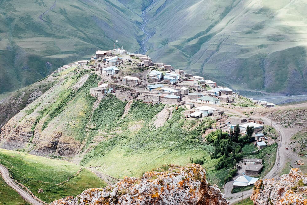 The high mountain village of Khinaliq, Azerbaijan, with houses on a peninsular that juts out into the Caucasus mountains.