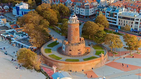 Getty Images Kołobrzeg's lighthouse was rebuilt after the town was almost entirely destroyed during WW2 (Credit: Getty Images)