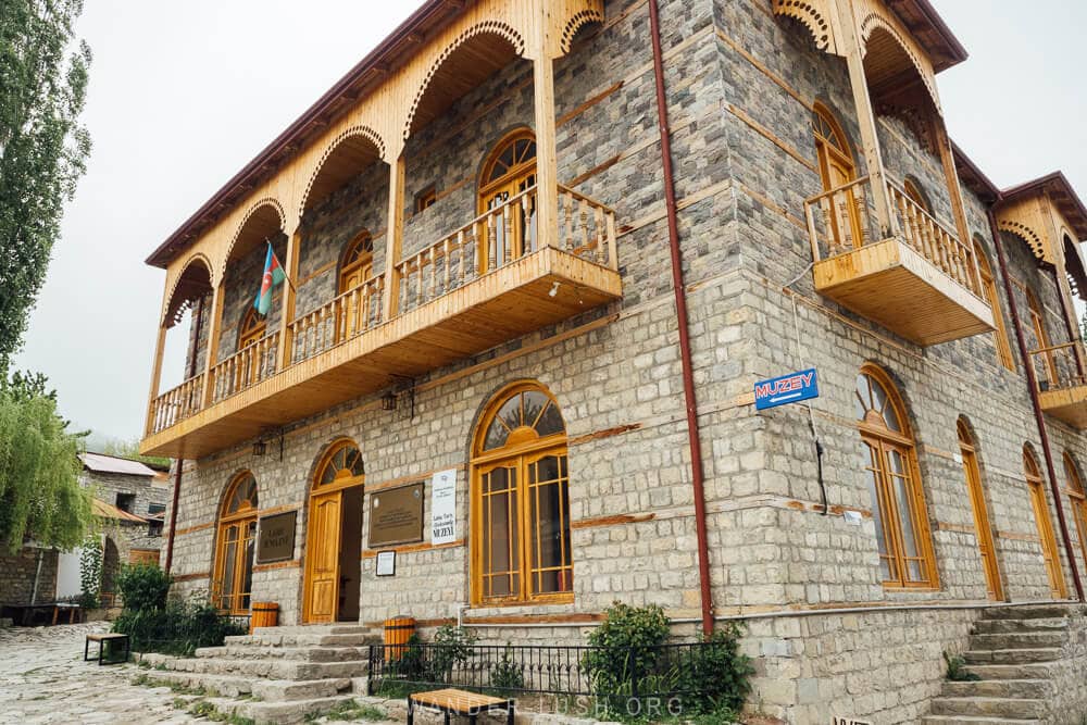 A stone building with wooden balconies that now functions as a museum in the village of Lahij, Azerbaijan.